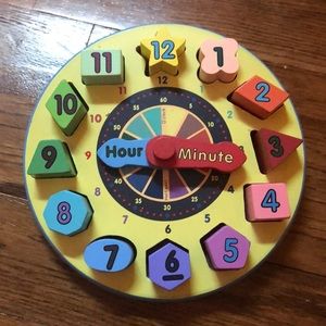 Shape Sorting Clock Melissa and Doug puzzle